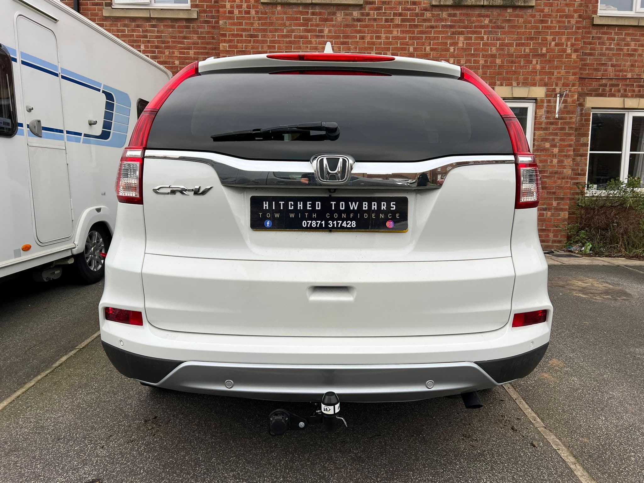 Towbar fitting in progress
